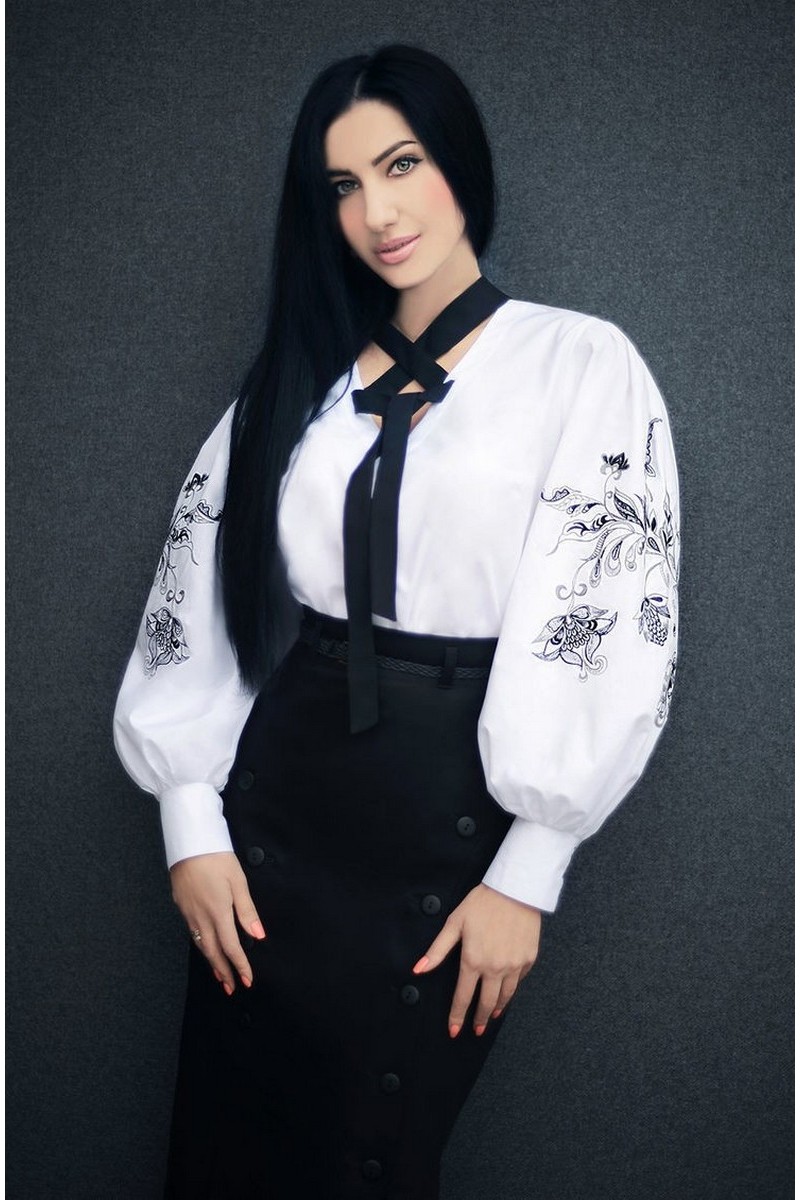 Buy White cotton exclusive women`s stylish blouse with embroidered sleeves